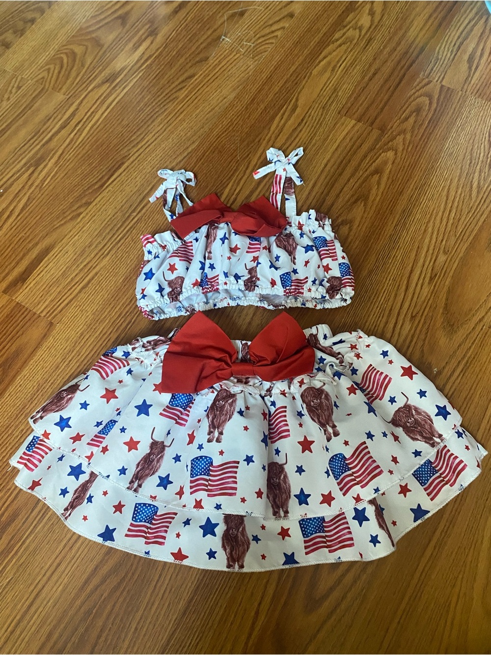 Toddlers Patriotic two-piece outfit featuring crop top and tiered skirt